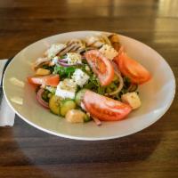 Greek Salad · Romaine lettuce, tomatoes, cucumbers, bell peppers, Kalamata olives, feta cheese, extra virg...
