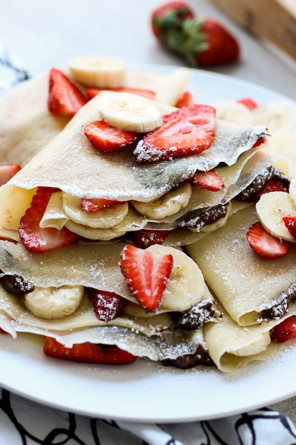Nutella Royale Crepe · Crepe filled with Nutella, bananas, strawberries and topped with powdered sugar.