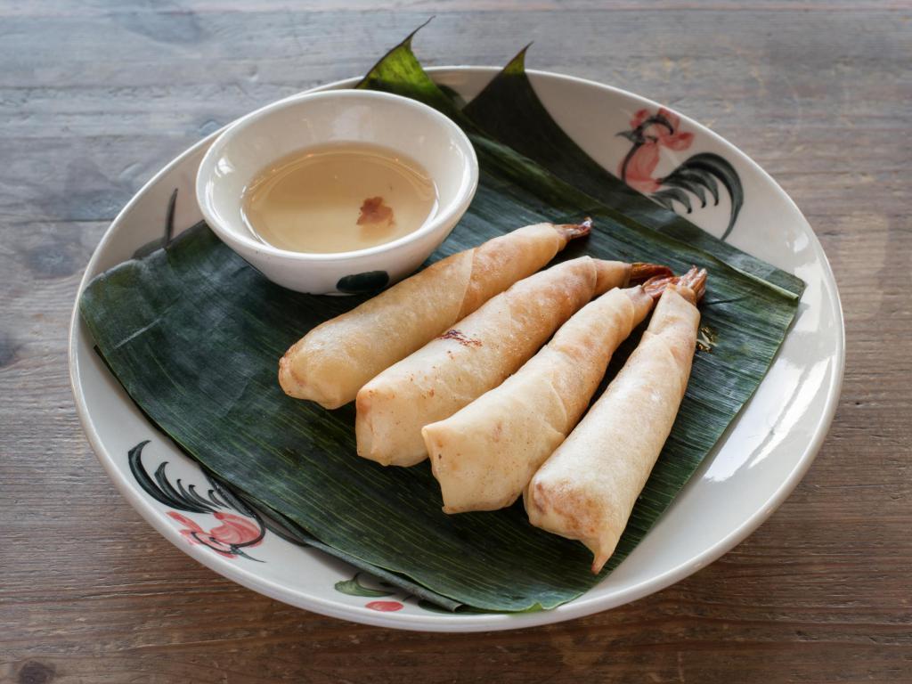 Crispy Shrimp Roll · Marinated shrimp wrapped in rice paper with plum sauce.