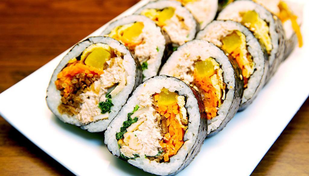 Tuna Kimbap (참치김밥) · Tuna salad, yellow pickle radish, carrot, burdock, egg, spinach sesame oil and seasoned rice with seaweed.