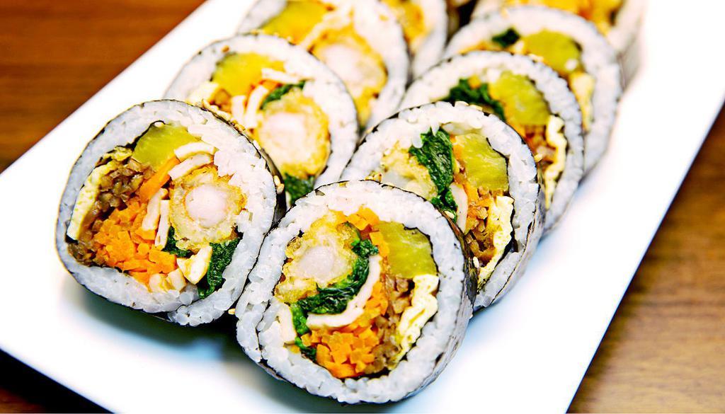 Shrimp Tempura Kimbap (새우튀김 김밥) · Shrimp tempura, yellow pickle radish, carrot, burdock, cabbage, spinach sesame oil and seasoned rice with seaweed.