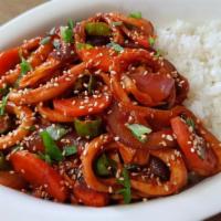 Spicy Squid over Rice (오징어 덮밥) · Spicy stir-fried squid and vegetables over white rice  and miso soup.