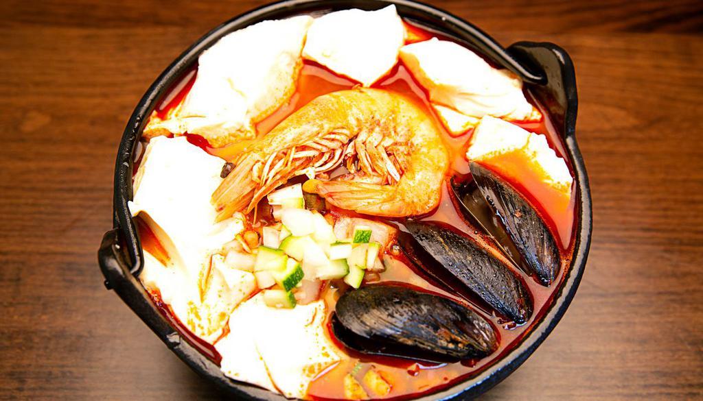 Seafood Jjampong Soft Tofu Soup (해물 순두부짬뽕) · Korean style spicy seafood soup with tofu