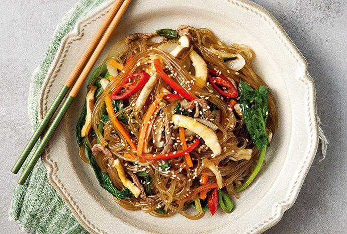 Japchae (잡채) · Stir-fried glass noodle with mixed vegetables, add extra bulgogi for an additional charge.