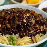 Jja Jang Myeon (짜장면) · Freshly made udon noodles with pork and vegetables in black bean sauce.