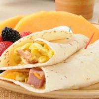 Classic Egg Wrap · Breakfast wrap made with ham, 2 cooked eggs, and home fries.