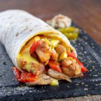 Egg and Turkey Wrap · Breakfast wrap made with 2 cooked eggs and turkey on a whole wheat wrap.