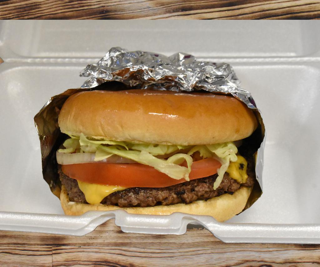 1/2 lb. Burger · Served with lettuce, tomato, onion, pickle and mayo, ketchup, mustard, 1/2 lb. cheeseburger.