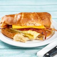 Croissant Sandwich · Scrambled egg, bacon and American cheese.