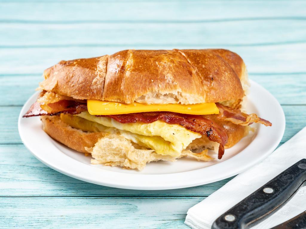Croissant Sandwich · Scrambled egg, bacon and American cheese.