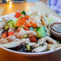 Poulette Salad · Mesclun lettuce, pulled rotisserie chicken and tomatoes with vinaigrette dressing.