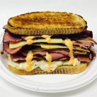 16. Ruben Sandwich( Top seller ) · Pastrami, melted Swiss cheese, coleslaw, and Russian dressing on choice of bread.