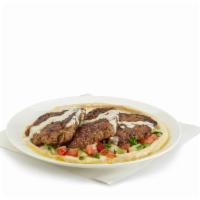 Lamb Kofta Hummus Salad · Grilled lamb patty with onions, parsley, mint, and spices. Grounded chickpea mix with onions...