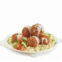 Falafel Rice · Grounded chickpea mix with onions, parsley, cilantro, garlic and spices, and deep-fried.
