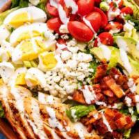 Cobb Salad · Grilled chicken, tomatoes, egg, bacon, crumbled blue cheese and red wine vinaigrette.