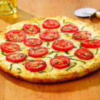 Northern Italian Pizza · Fresh tomatoes, virgin olive oil, roasted garlic, ricotta, oregano, and mozzarella cheese.