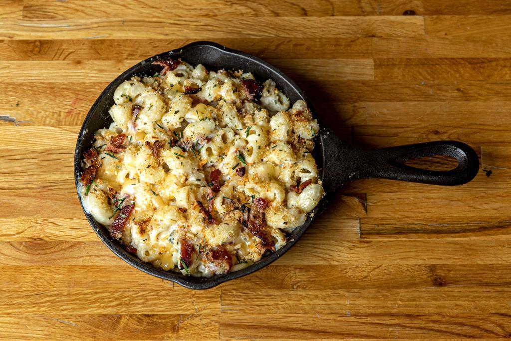 Three Cheese Mac · Our perfect trio of blended mozzarella, fancy cheddar, and american cheeses will remind you that variety really is the spice of life.