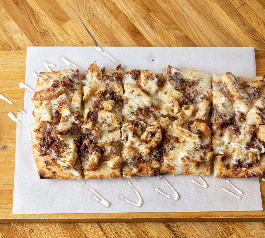 Chicken Bacon Ranch · The holy trinity of Chicken, Bacon, and Ranch, served on a flatbread with melted provolone and mozzarella.