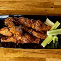 Traditional Wings · Our traditional bone-in wings are slow roasted and seasoned to perfection. Juicy inside and ...