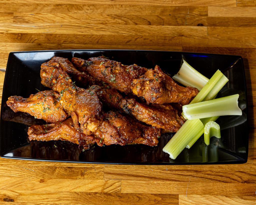 Traditional Wings · Our traditional bone-in wings are slow roasted and seasoned to perfection. Juicy inside and crispy outside, with your choice of one of our delicious sauces