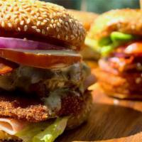 La “Chule-Burger” · Homemade beef patty, ham, bacon, breaded pork cutlet, mozzarella, onions, tomato, lettuce & ...