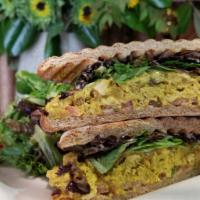 Moroccan Chicken Breast Sandwich · Served with curry, raisins, mayo, tomatoes and baby greens on whole wheat bread. Comes with ...