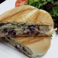 Tuna, Cranberry and Fuji Apple Panini · Served with dried cranberries, Fuji apples, onions, Roma tomatoes and alfalfa sprouts on cia...