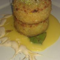 Jumbo Lump Crab Cake · Served with passion fruit and chipotle mayo sauce and a house salad.