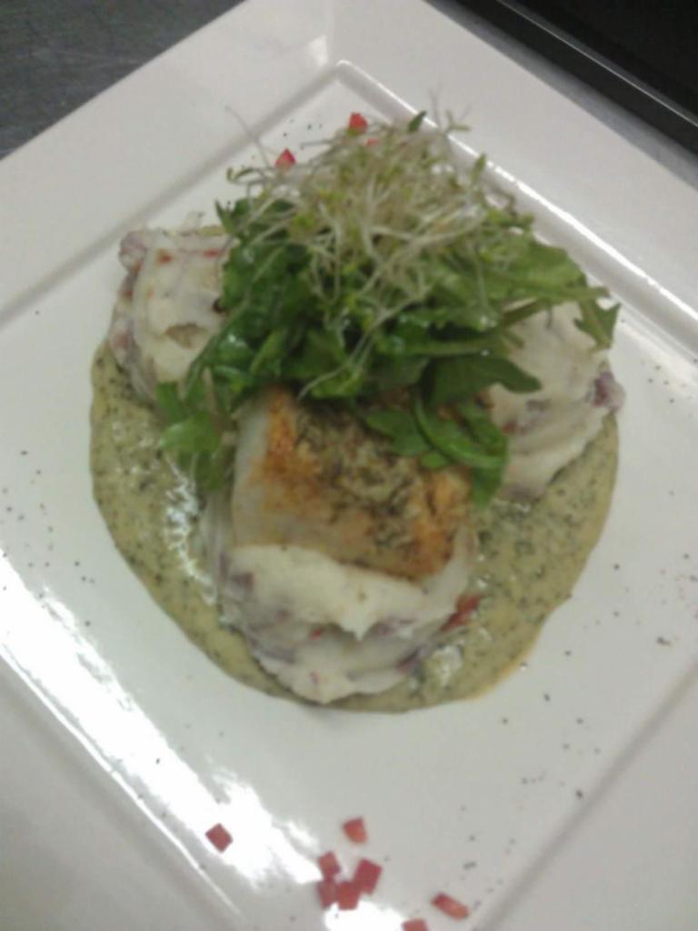 10 oz. Wild Caught Chilean Sea Bass · Served with homemade mashed potatoes and creamed spinach.
