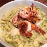 Pesto White Beans and Shrimp Pasta · Penne with white beans in a creamy homemade pesto sauce and jumbo shrimp.