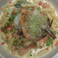 Pasta Primavera with Shrimp · Served with seasonal vegetables, Parmesan cheese and cream.