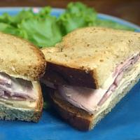 Cordon Bleu Sandwich · Smoked ham, chicken, Swiss and mayo on wheat bread.