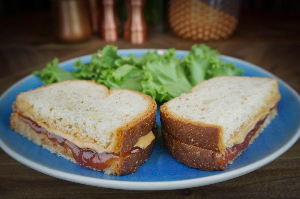 Peanut Butter and Jelly Sandwich · Creamy Peanut Butter and Strawbery Jelly on wheat bread. Vegan.