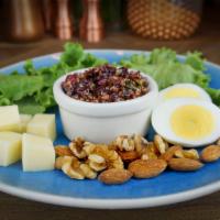 Primal Pack · Red quinoa salad, hard-boiled egg, mild white cheddar cubes, almonds and walnuts.
