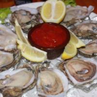 Grilled Oysters on the Half Shell · 