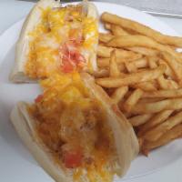 Po' Boy Sandwich · Fried shrimp with tomato and shredded cheddar-jack on a sub roll.