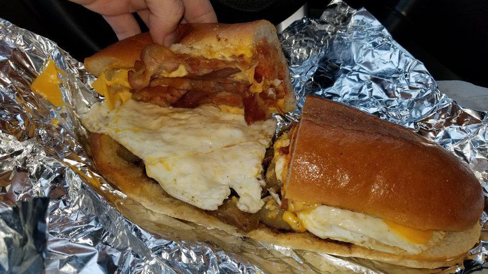 Bacon, Egg & Cheese on a Roll   · Sandwich served on a soft bread roll.