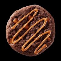 Caramel Brownie · Fudgy and chewy brownie cookie filled with chocolate and caramel bits, topped with a rich ca...
