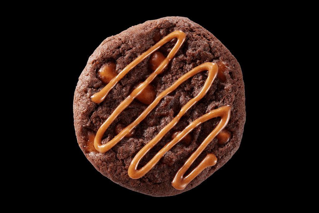 Caramel Brownie · Fudgy and chewy brownie cookie filled with chocolate and caramel bits, topped with a rich caramel drizzle. Limited time only at participating shops.
