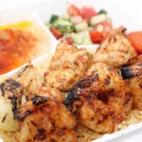 Chicken Surf and Turf · Fire Grilled Chicken & Shrimp Over Rice 