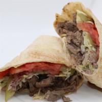 Beef Shawarma Wrap · Fire Grilled Beef Wrapped in Pita Bread with Tehini Salad