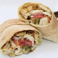 Chicken Shawarma Wrap · Fire Grilled Chicken Wrapped in Pita Bread with Tehini Salad