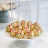 Lemon Raspberry Cake Pop · Lemon cake combined with raspberries extract then dipped in a pale yellow white chocolate an...