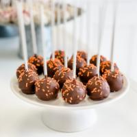 Orange Chocolate · Our moist orange cake dipped in chocolate and covered in orange sprinkles. If you like an or...