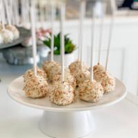 Toasted Coconut Cake Pop · Coconut cake dipped in white chocolate and covered in toasted coconut. All cake pops are ind...