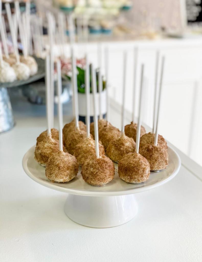 Snickerdoodle Cake Pop · Our famous cinnamon cake, covered in white chocolate and sprinkled with snickerdoodle cookie crumbs. All cake pops are individually wrapped.