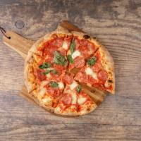 Diavola Pizza · D.O.P. tomato sauce, mozzarella, Italian spicy salami, basil.