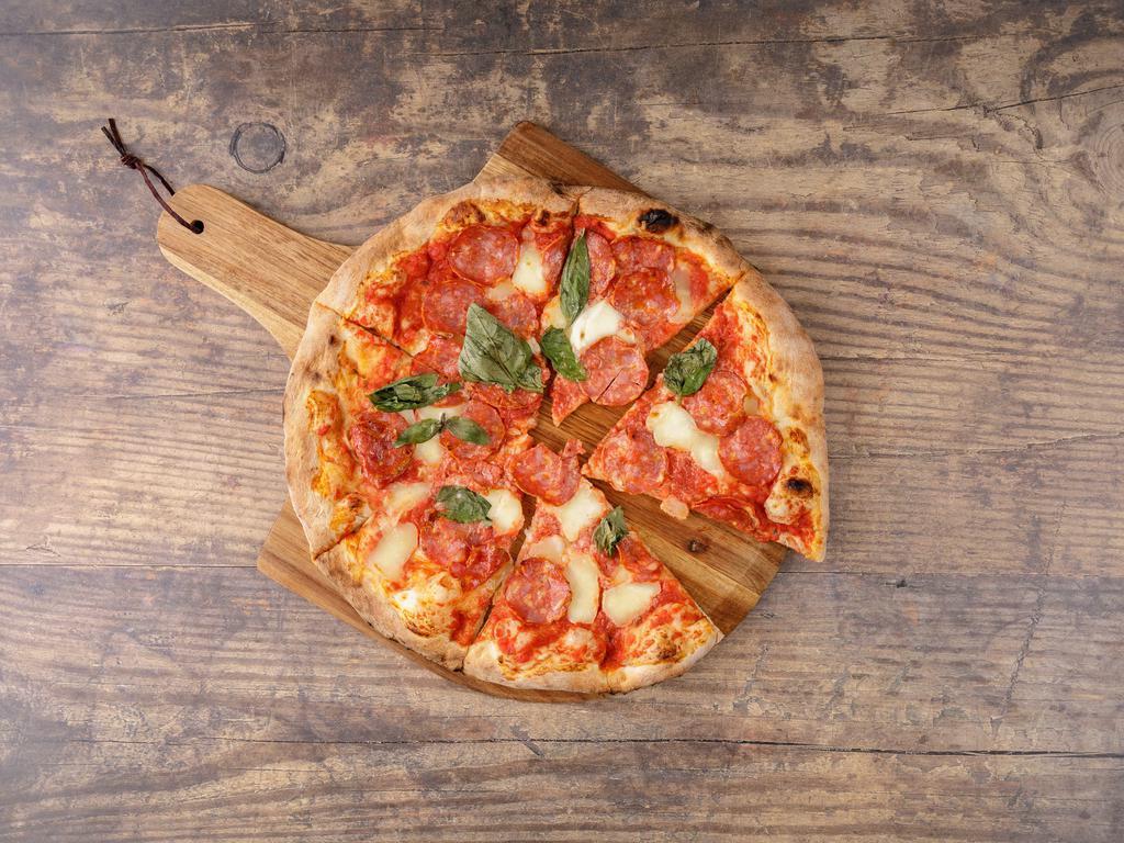 Diavola Pizza · D.O.P. tomato sauce, mozzarella, Italian spicy salami, basil.