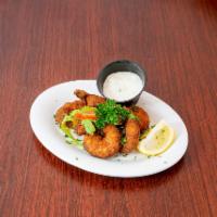 Fried Shrimp · 5 pieces. Lightly battered shrimp served with tarter sauce.