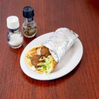 Falafel Sandwich · Served on pita with lettuce tomatoes onions and tahini sauce.